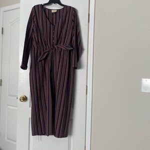 Long sleeve jump suit.